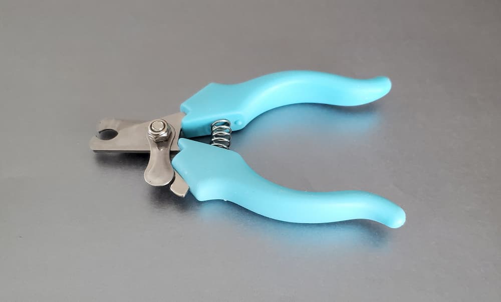 Scissor or plier style nail clippers for dogs