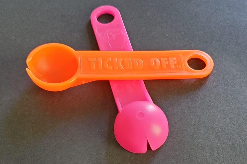 Tick scoop of removing ticks from pets