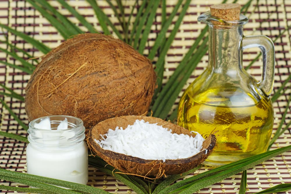 Coconut oil and olive oil on a table