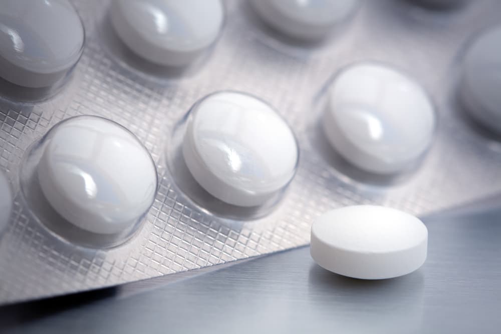 white pills in package