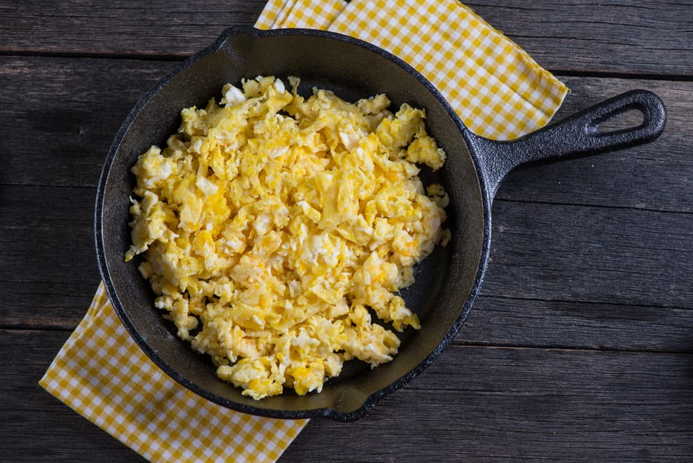cooked eggs in frying pan