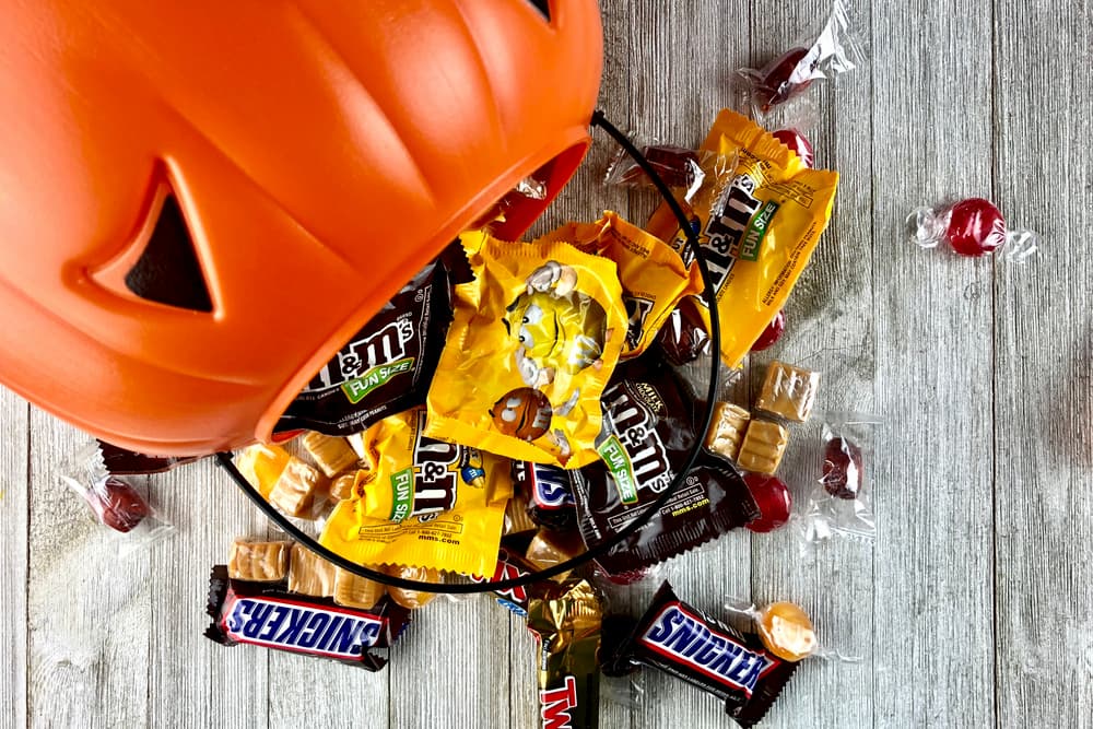 Halloween candy wrappers on a table