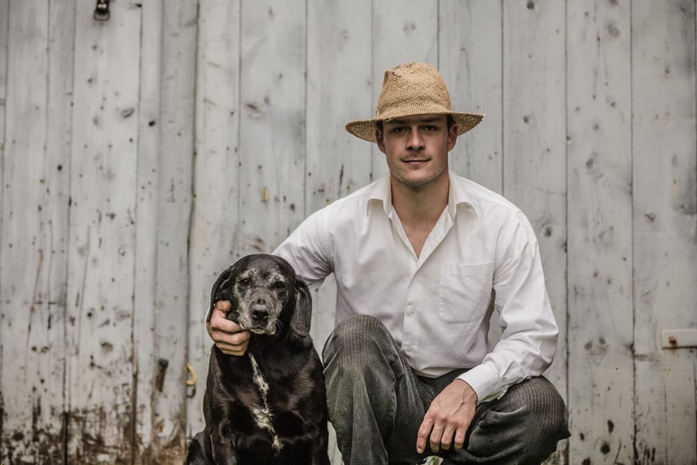 Old fashioned photo of man and dog