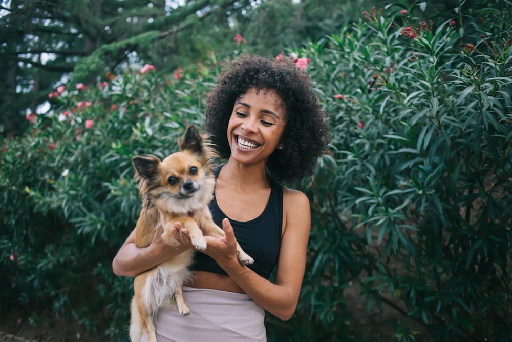Lady holding her dog
