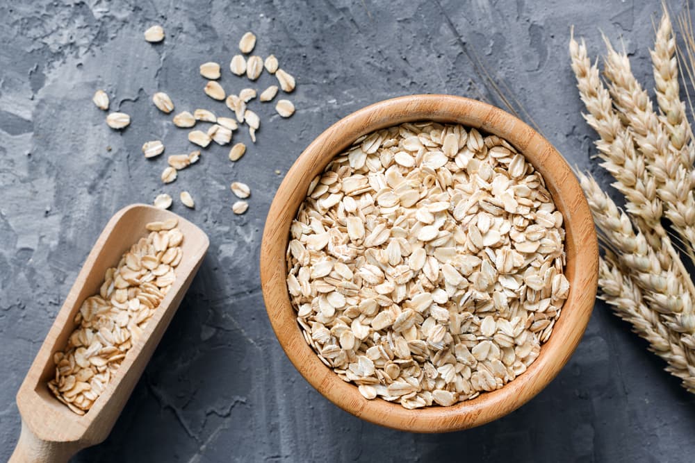 Big bowl of oats on a slate board