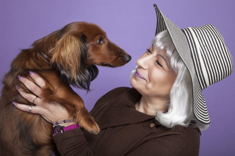 Old lady with Dachshund