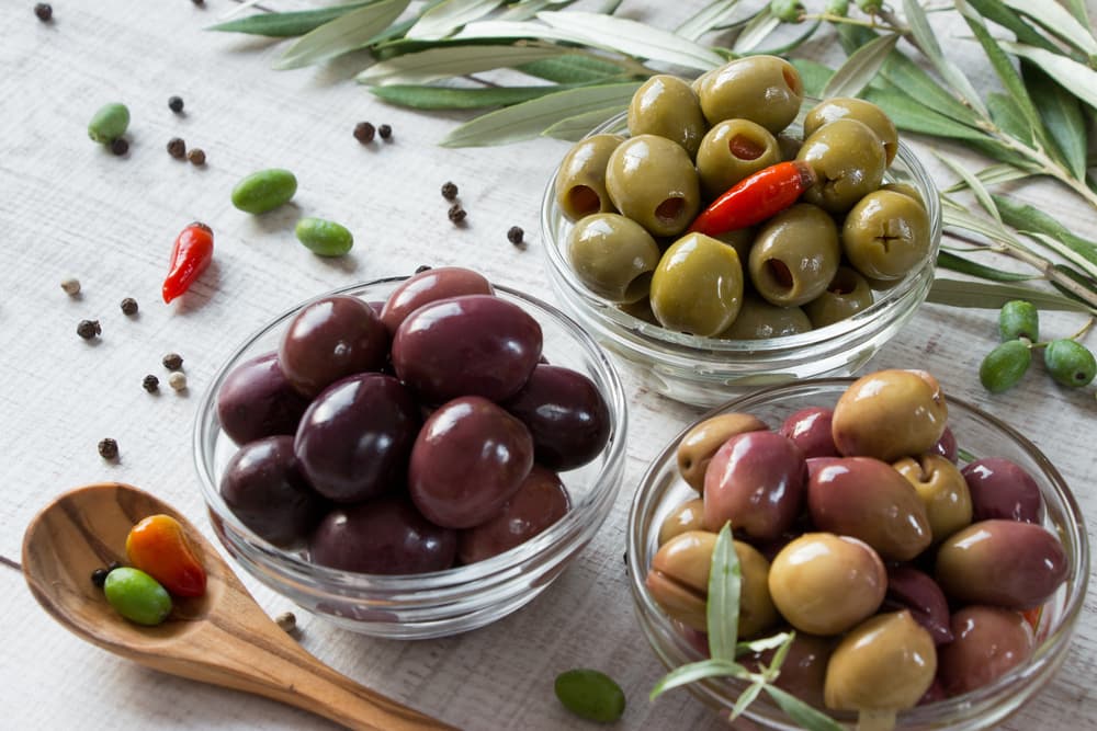 olives in bowls on a table